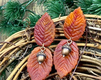 Rust and amber swirl colored leaves with copper acorns