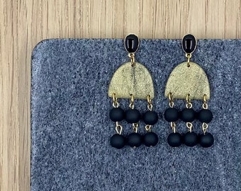 Gold glitter and black marble dangle earrings with hand-strung matte black glass beads
