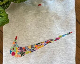 nike floral swoosh