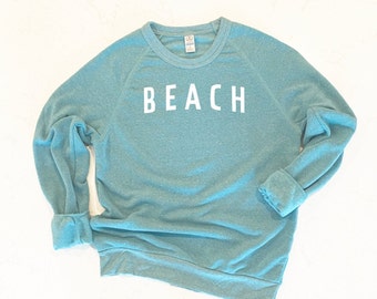 sweater that says beach