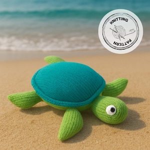 May include: A knitted turtle toy with a teal shell and green limbs, resting on a sandy beach. The turtle has a white and black eye. A circular logo in the upper right corner reads "Knitting Pattern".
