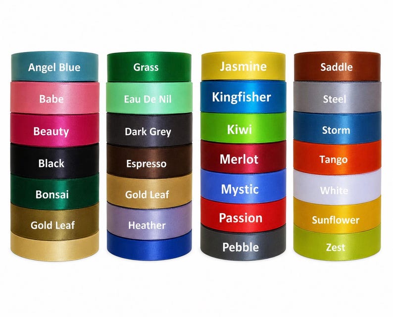 May include: Stacks of colorful satin ribbon rolls in various shades, including blue, pink, green, and yellow. Each roll is labeled with its color name, such as "Angel Blue," "Babe," and "Jasmine." The ribbons are neatly arranged, showcasing a wide range of hues.