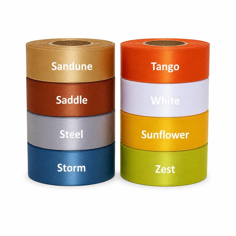 May include: Two stacks of satin ribbon rolls in various colors. The colors include Sandune, Saddle, Steel, Storm, Tango, White, Sunflower, and Zest. Each roll has the color name printed on it.