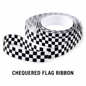 May include: A roll of black and white chequered flag ribbon. The ribbon is partially unrolled, with a section lying flat and the rest coiled. The text "CHECKERED FLAG RIBBON" is printed in black at the bottom of the image.