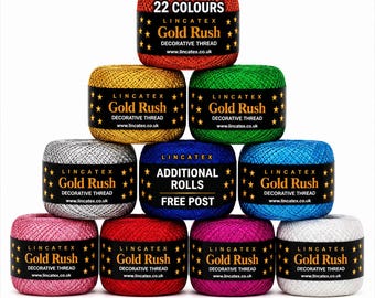 May include: A pyramid stack of ten Lincatex Gold Rush decorative thread spools in various colors including red, gold, green, silver, blue, pink, and white. Each spool features a black label with gold stars and the text 22 COLOURS or ADDITIONAL ROLLS FREE POST.