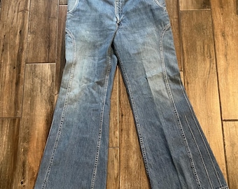 Spodnie dzwony Levi's z lat 70. XX wieku z wysokim stanem i rozkloszowanymi nogawkami, 36x31 cali, dżins hipisowski, pomarańczowy, z zakładką