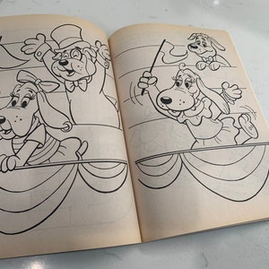 May include: Black and white line art illustration of three cartoon dogs. The dogs are wearing hats and holding flags. The dogs are standing on a stage with a curtain behind them.