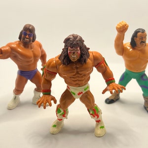 WWE Vintage Wrestlers 80s Toys Hasboro Macho King Randy Savage, Ultimate Warrior Action, Jake “The Snake” Roberts Bundle