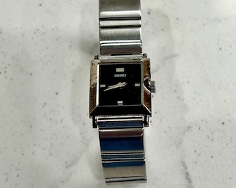 Vintage Seiko klocka för kvinnor, silver och svart, tvåfärgad, 1N00-6N30, Japan