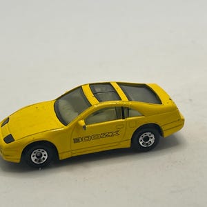 Matchbox Yellow Nissan 300ZX MB-61 Diecast 1:59 Vintage 1990