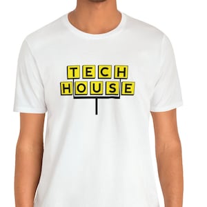 May include: White t-shirt with a black and yellow graphic of the words "TECH HOUSE" in block letters.