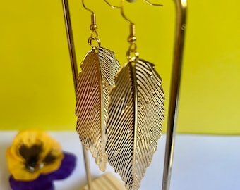 Statement feather dangle earrings