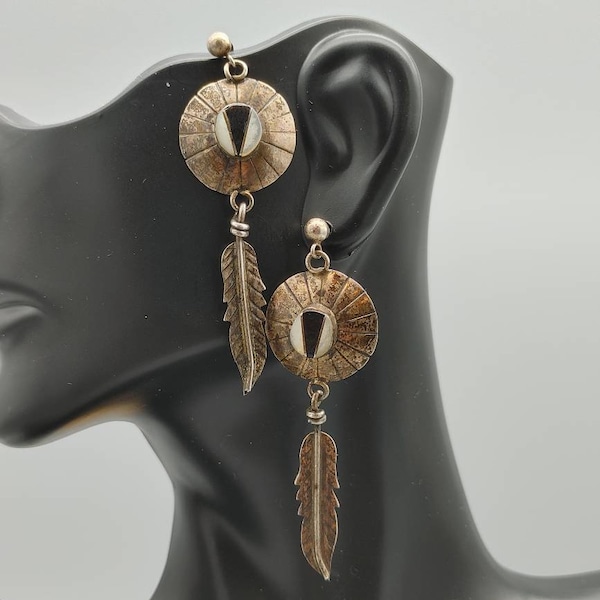 Old Vintage Navajo, signed Glen Sandoval, Mother of Pearl and black Onyx  concho feather dangle earrings.   JT299