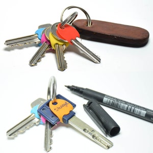 Key Identifiers. Silicone Key Caps Covers. Perfect solution to Identify Your Key. Mixed Color Coded Labels. Key Toppers. Pack of 24 or more