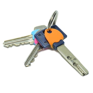 Key Identifiers, Key Toppers, Key Cap Covers, Key Cap Labels, House Key Caps, Key Tags, Key Organizers, Key Protectors
