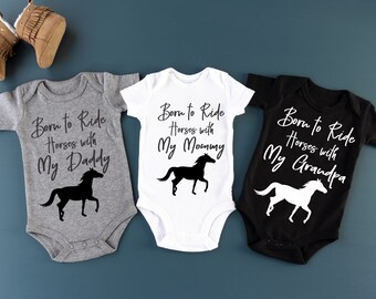 baby clothes with horses on them