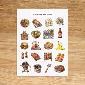 Peut inclure: Une feuille d'autocollants illustrant des plats et des boissons en aquarelle, notamment des hamburgers, des hot-dogs, des côtes levées, des brochettes, de la salade, de la bière, de la limonade et de la sauce barbecue. Les autocollants sont étiquetés "L'armoire des profs".