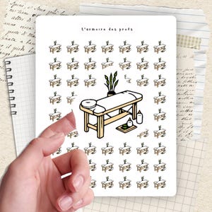 May include: A sheet of stickers featuring massage tables, candles, and plants. The text "L'armoire des profs" is at the top. The stickers are on a white background, with a hand partially visible.