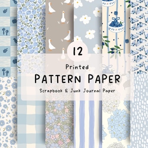 Peut inclure: Un ensemble de 12 papiers à motifs imprimés pour le scrapbooking et le junk journaling. La collection présente divers designs incluant des fleurs bleues, des oies blanches sur fond beige, des papillons bleus, des rayures et des bols de myrtilles.
