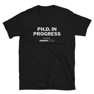May include: Black t-shirt with white text that reads "PH.D. IN PROGRESS" and a progress bar that says "Loading..."