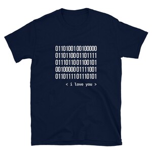 May include: Navy blue t-shirt with a white graphic of binary code that translates to "i love you".