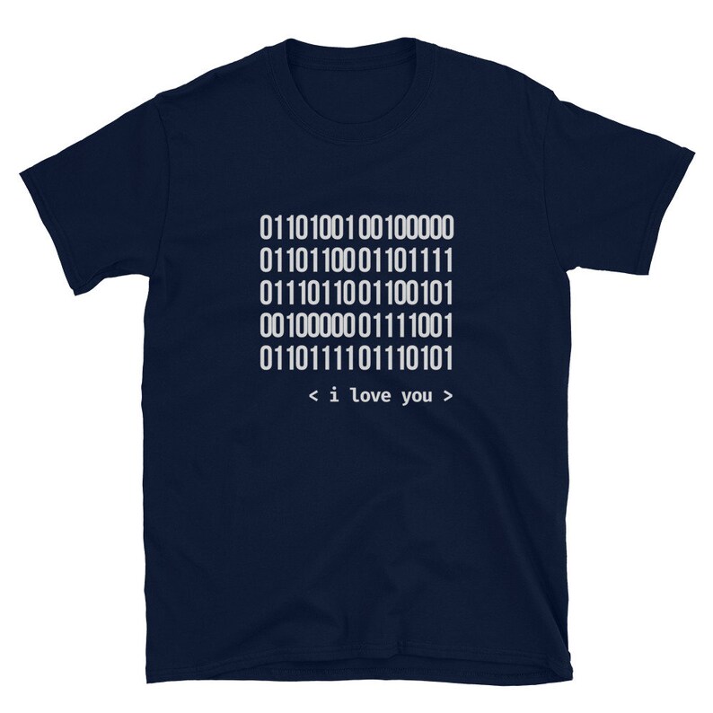 May include: Navy blue t-shirt with a white graphic of binary code that translates to "i love you".
