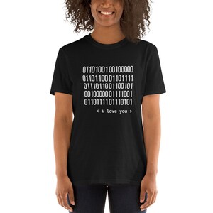 May include: Black t-shirt with a white graphic of binary code that translates to "i love you".