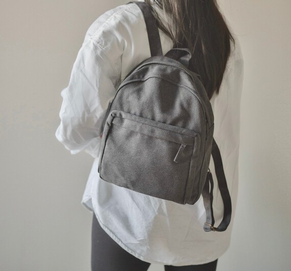 small black canvas backpack