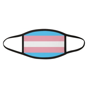 May include: A black face mask featuring a transgender pride flag design. The flag has light blue, pink, and white horizontal stripes.