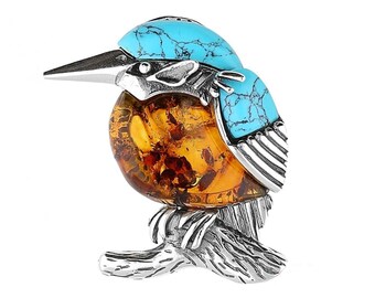 Broche de prata com âmbar báltico e turquesa, modelo martim-pescador.