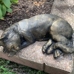 Sleeping cat garden statue antique brass