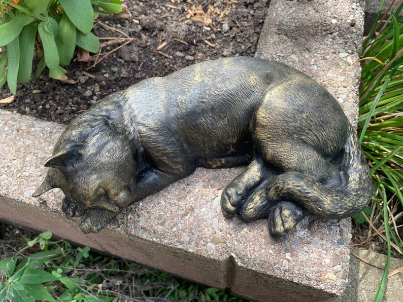 Sleeping cat garden statue antique brass