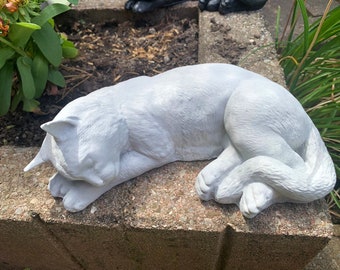 Sleeping cat garden statue