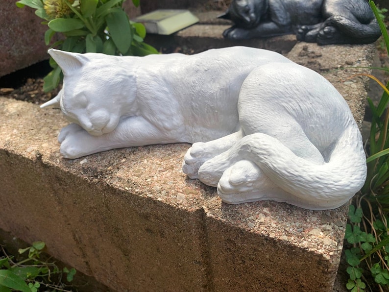 sleeping cat statue