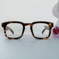 Oversized Squared Reading Glasses | Large, oversized square reading glasses, available in two colors: Havana brown and green. Stylish and fashionable. product logo