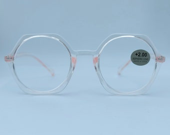 May include: Clear plastic framed glasses with pink accents and a sticker that reads " +2.00 Aspheric Lens Wave & Soge "