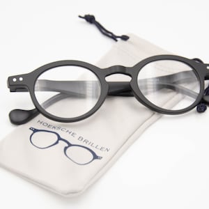Matte black reading glasses +1.00 +1.50 +2.00 +2.50 +3.00 +3.50. Glasses with round lenses.