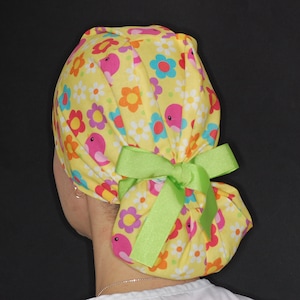 Flowers and birds ponytail surgical cap for doctors, nurses, dentist, surgeons.