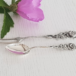 Silver set: spoon and dessert fork. Antique silver spoon. Vintage silver dessert fork. Ornate spoon. Silver serving cutlery.