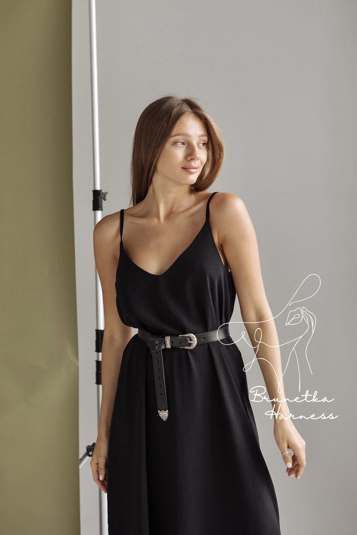 Black dress with silver belt deals