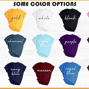 Images show the different shirt color options. The shirt color options are red, gold, white, black, light pink, light green, charcoal, light blue, purple, military green, orange, navy blue, maroon, royal blue, dark gray heather, and athletic heather.