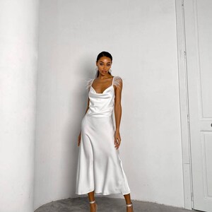 midi dress with feathers