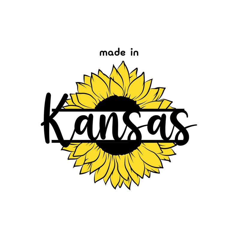 May include: A yellow sunflower with a black center and the text "made in Kansas" written in a black script font.