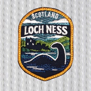 May include: Embroidered patch featuring the Loch Ness Monster. The patch has a blue, green, and gold color scheme, with the words "SCOTLAND" and "LOCH NESS" in white. The design includes the monster's silhouette in the water.