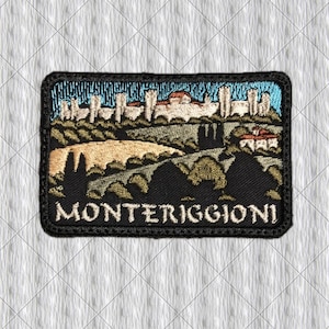 May include: A rectangular embroidered patch featuring a landscape scene of the walled town of Monteriggioni. The design includes a light blue sky, stone fortifications, rolling hills in shades of tan and green, and the text MONTERIGGIONI in white.