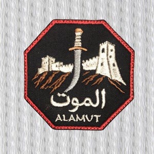 May include: A trio of cream-glazed ceramic mugs with a speckled finish. Each mug is adorned with a hand-painted floral design in blue, green, and yellow hues. The mugs have a simple, rounded form and a comfortable handle.