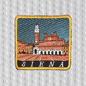May include: A square embroidered patch featuring a depiction of the Siena town square with a tall tower and buildings in shades of orange and brown against a blue sky. The word SIENA is stitched in white capital letters on a black base.