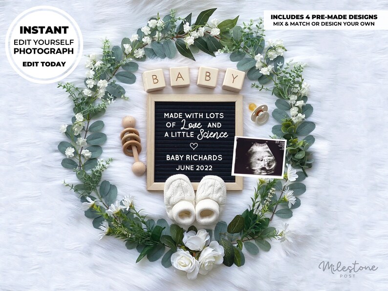 May include: A white background with a wreath of greenery and white flowers. In the center of the wreath is a black letter board with the text "MADE WITH LOTS OF Love AND A LITTLE Science" and "BABY RICHARDS JUNE 2022". There are also wooden blocks that spell out "BABY", a pacifier, a wooden rattle, and a baby ultrasound image.