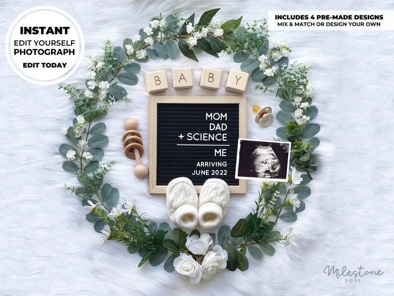 May include: A black letter board with the text "Mom Dad + Science Me Arriving June 2022".  The letter board is surrounded by a wreath of greenery and white flowers. There are also wooden blocks that spell "Baby", a pacifier, a wooden rattle, and a black and white ultrasound image.