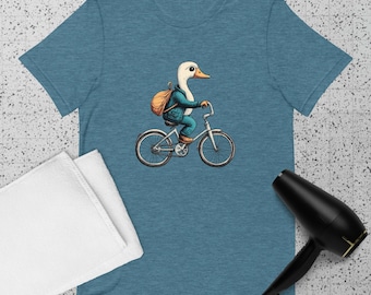 Unisex t-shirt Duck/Goose on a Bicycle: A Hilarious Ride on Two Wheels – Graphic Tee